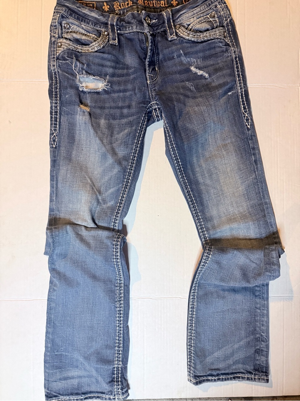 Rock Revival Men's Faded Blue Straight Jeans with Distressed Accents